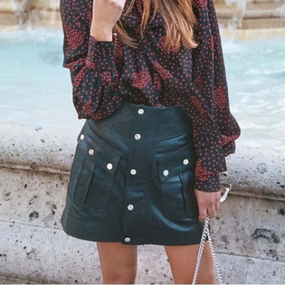 The Kooples leather mini skirt with big front popper pockets.